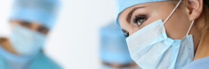 surgery assistant looks to the side